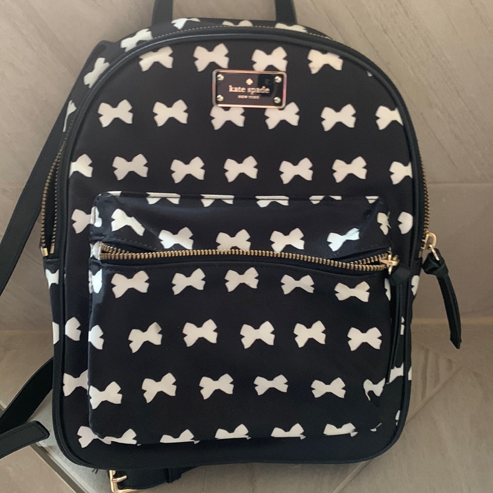 Almost new Kate Spade black and white bow mini book bag/purse